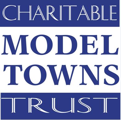 A blue and white logo for the Charitable Model Towns Trust. The text is in a bold, sans-serif font.